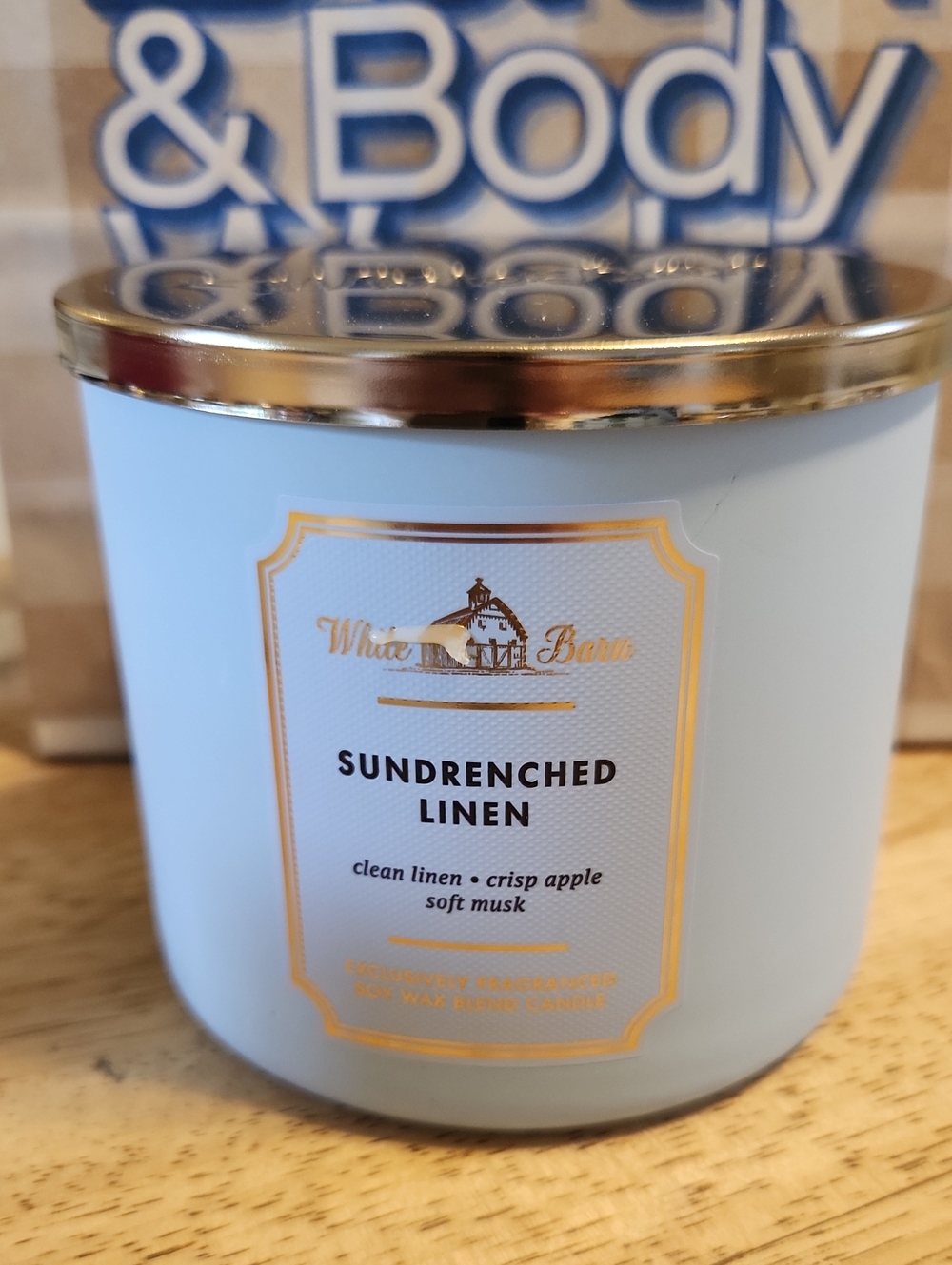White Barn Sundrenched Linen Candle - pale blue with gold lid